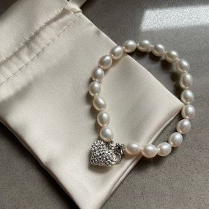 Never worn! Brand new and would make a great bridal gif!